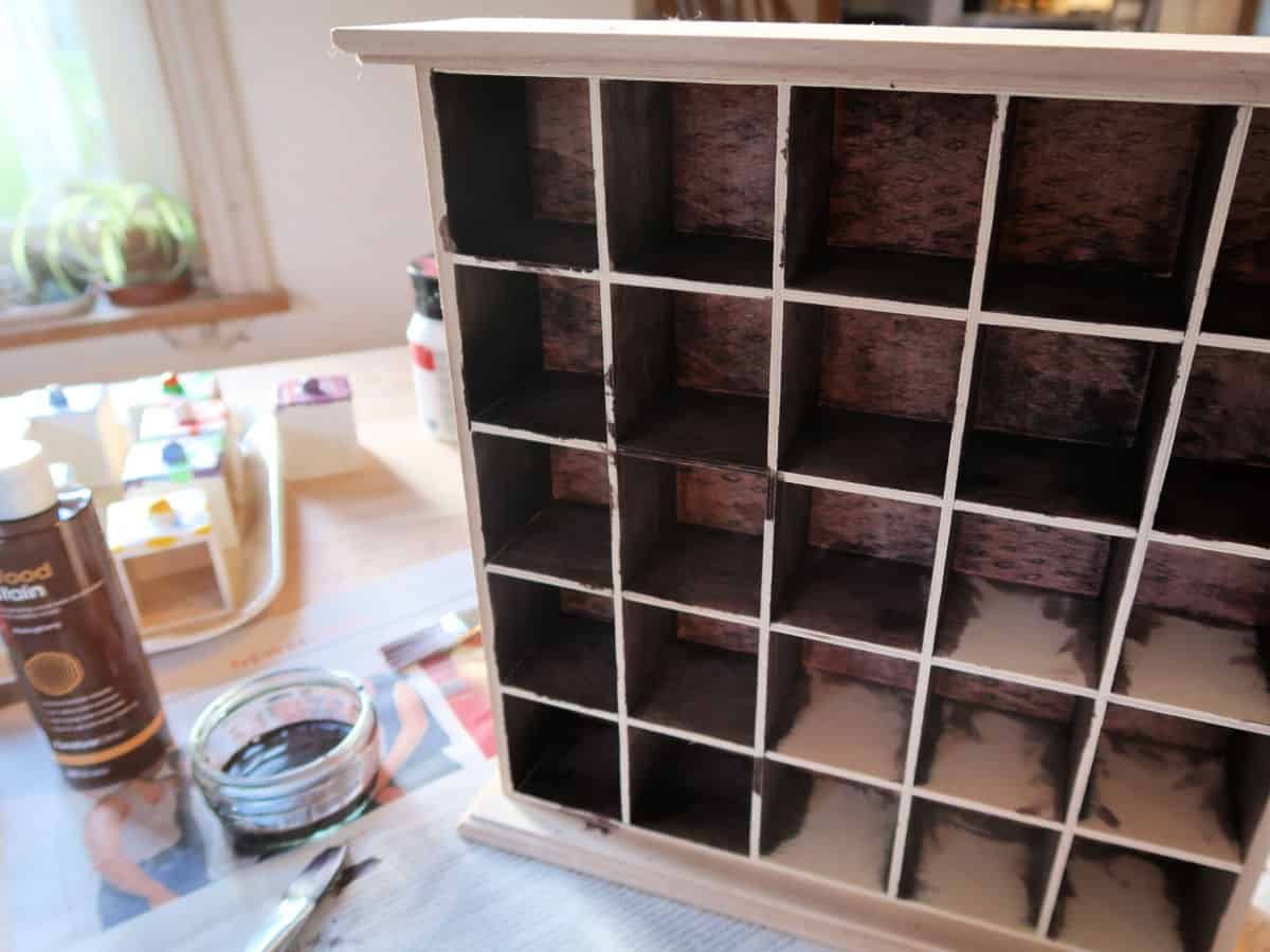 DIY Spice Chest made from an advent calendar box and air-dried clay. This easy craft tutorial turns a plain wooden advent calendar box into a gorgeous spice chest with clay fronted drawers decorated with acrylic paints. Perfect for holding spices or little knick-knacks.